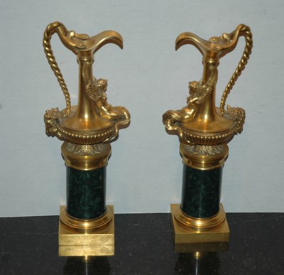 Lot 488 - Pair of Simulated Marble and Gilt-Bronze Ewers...