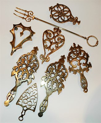 Lot 402 - Group of Brass Trivets and Forks Approximately...