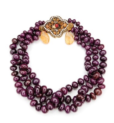 Lot 270 - Iradj Moini Triple-Strand Necklace Ruby beads...