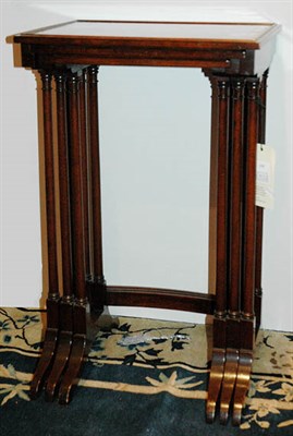 Lot 135 - Regency Style Banded Mahogany Nest of Three...