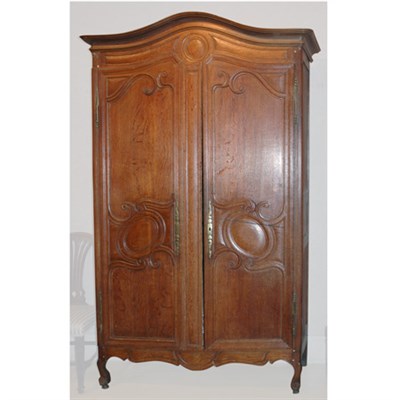 Lot 146 - Louis XV Oak Armoire The rectangular top...