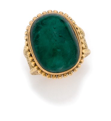 Lot 251 - Gold and Cabochon Emerald Ring