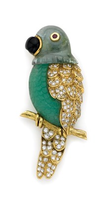 Lot 448 - Gold, Carved Green Stone, Emerald, Diamond and Black Onyx Parrot Brooch