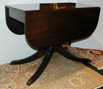 Lot 119 - Regency Style Mahogany Drop-Leaf Dining Table...