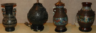 Lot 145 - Two Asian Metal Lamps; Together with Two Asian...