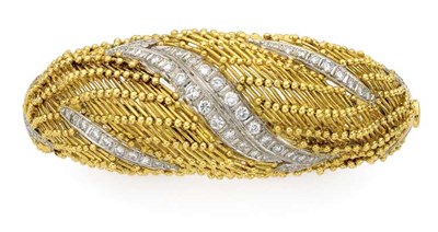 Lot 355 - Gold, Platinum and Diamond Bangle