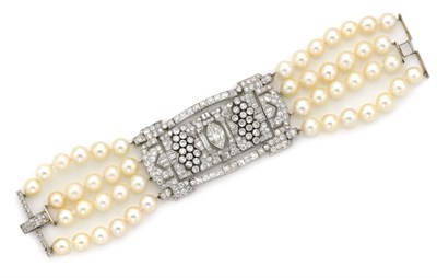 Lot 547 - Four Strand Cultured Pearl and Diamond Bracelet