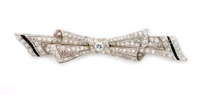 Lot 334 - Art Deco Diamond and Black Onyx Bow Brooch