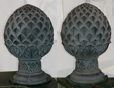 Lot 426 - Pair of Cast Iron Pineapple-Form Garden...