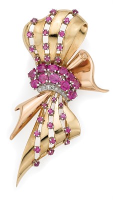Lot 479 - Two-Color Gold, Platinum, Ruby and Diamond Bow Clip