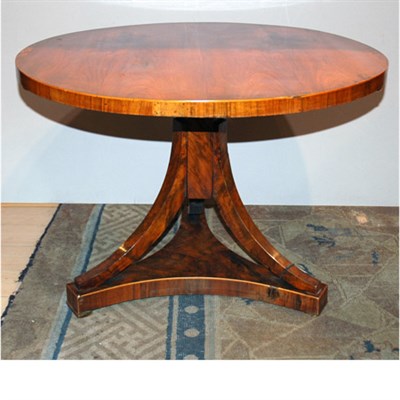 Lot 264 - Biedermeier Walnut Low Table The circular top...