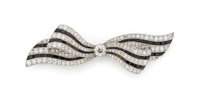 Lot 538 - Art Deco Diamond and Black Onyx Bow Brooch