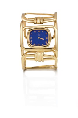 Lot 143 - Gold and Lapis Bangle-Watch, Baume and Mercier