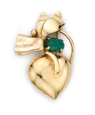 Lot 495 - Gold and Cabochon Emerald Clip-Brooch, Seaman Schepps