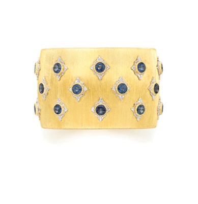 Lot 402 - Two-Color Gold and Sapphire Cuff Bangle, Mario Buccellati