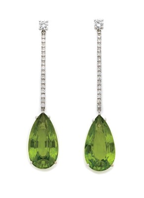 Lot 375 - Pair of Peridot and Diamond Pendant-Earrings