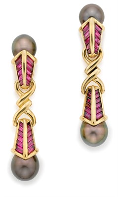 Lot 356 - Gold, Black Cultured Pearl and Ruby Ring and Pair of Pendant-Earclips, Rene Boivin