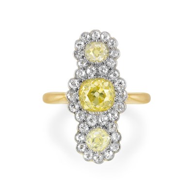 Lot 417 - Fancy Intense Yellow Diamond and Diamond Ring