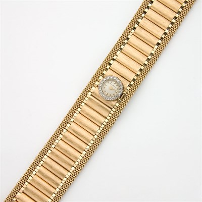 Lot 264 - Wide Gold and Diamond Bracelet-Watch, Baume & Mercier