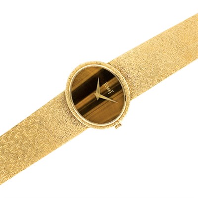 Lot 335 - Gold and Tiger's-Eye Wristwatch, Piaget