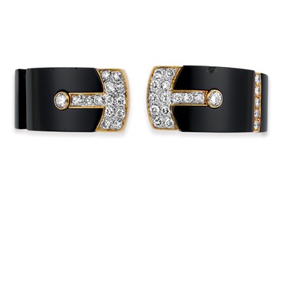 Lot 329 - Gold, Black Onyx and Diamond Bangle Bracelet