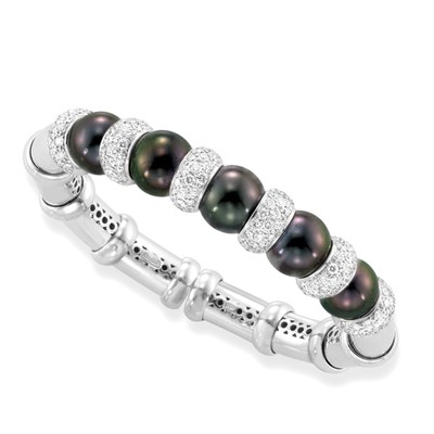 Lot 449 - White Gold, Black Cultured Pearl and Diamond Bangle Bracelet, J. Stella