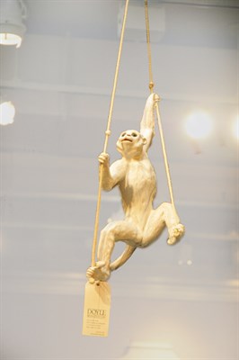 Lot 3166 - French White Glazed Ceramic Monkey With glass...