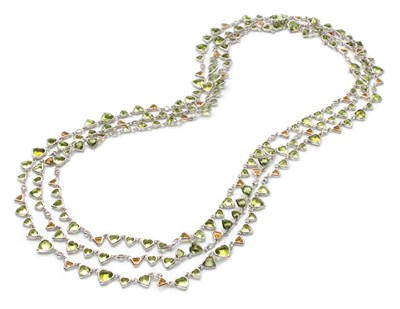Lot 229 - Long White Gold Peridot, Citrine and Diamond Chain