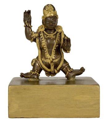 Lot 16 - Tibetan Gilt-Bronze Figure of Mahakala...