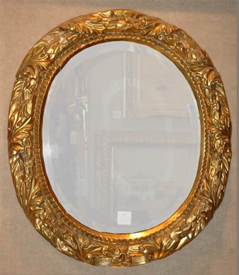 Lot 1427 - Baroque Style Gilt-Wood Mirror Of oval form,...