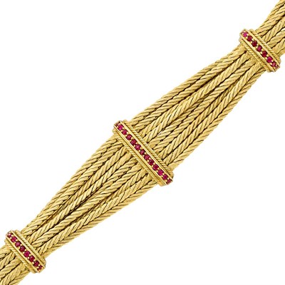 Lot 648 - Nine Strand Gold and Ruby Bracelet