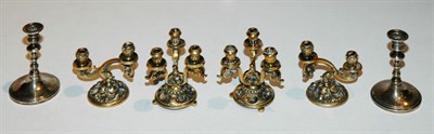Lot 3563 - Three Pairs of Metal Miniature Candlesticks