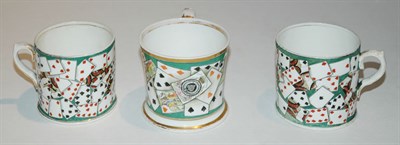 Lot 3588 - Three Porcelain Mugs Decorated with playing...