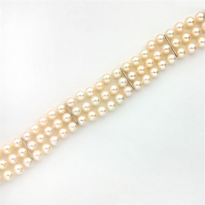 Lot 328 - Triple Strand Cultured Pearl Bracelet with Diamond Clasp