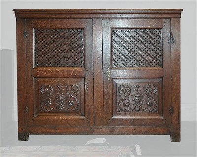 Lot 128 - Gothic Style Oak Two-Door Cabinet Height 42...