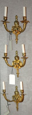 Lot 365 - Three Rococo Style Gilt-Bronze Two-Light...