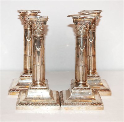 Lot 293 - Set of Four English Silver Candlesticks Weighted.
