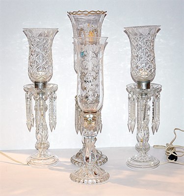 Lot 166 - Group of Four Baccarat Style Glass Candlestick...