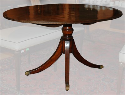 Lot 234 - Regency Style Banded Mahogany Oval Breakfast...