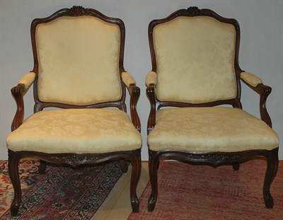 Lot 464 - Pair of Louis XV Style Carved Fruitwood Fauteuils