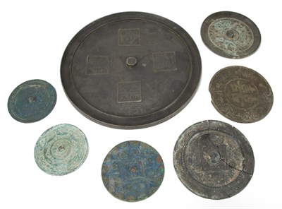 Lot 186 - Group of Seven Chinese Bronze Mirrors Han...