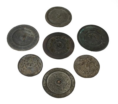 Lot 195 - Group of Seven Chinese Bronze Mirrors Han...