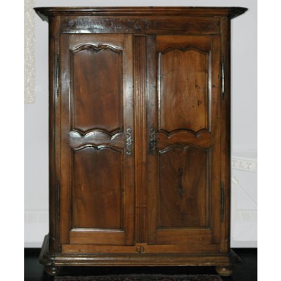 Lot 160 - Provincial Early Louis XV Walnut Armoire...