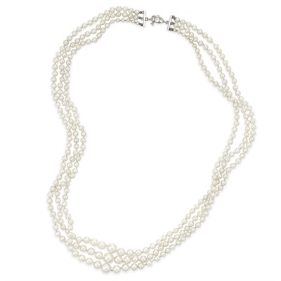 Lot 512 - Triple Strand Natural Pearl Necklace with Diamond Clasp, Tiffany & Co.