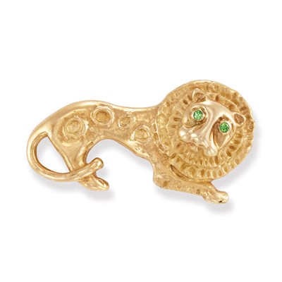 Lot 490 - Gold and Demantoid Garnet Lion Clip-Brooch, Rene Boivin