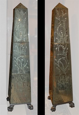 Lot 449 - Pair of Mirrored Glass Obelisks Height 70 inches.