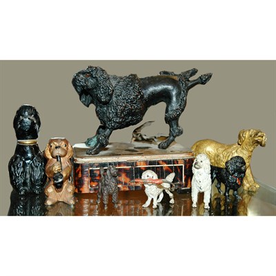 Lot 18 - Group of Eight Metal Miniature Figures of Dogs...