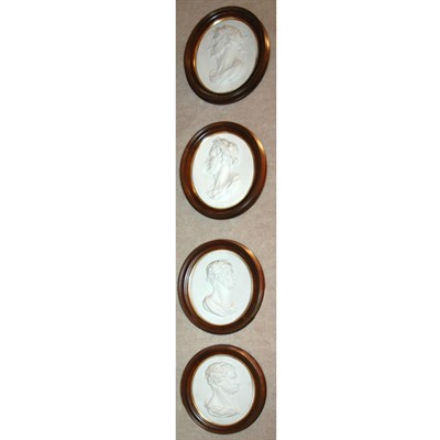 Lot 391 - Set Four Neoclassical Style Oval Bisque...
