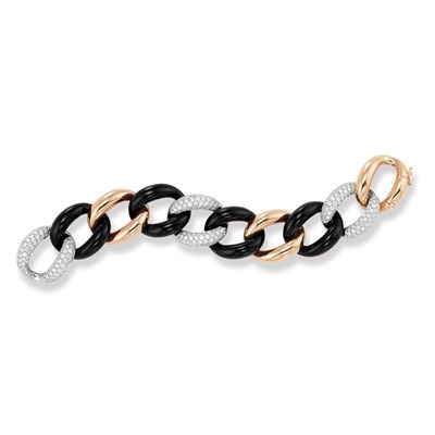Lot 472 - Two-Color Gold, Black Onyx and Diamond Bracelet