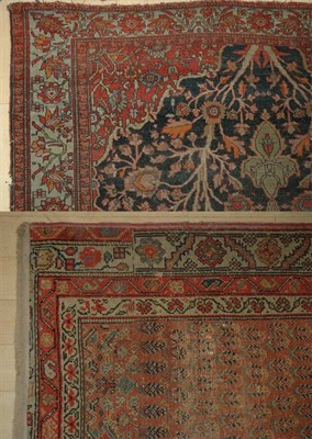 Lot 518 - Two Persian Rugs Comprising a Sarouk rug and a...